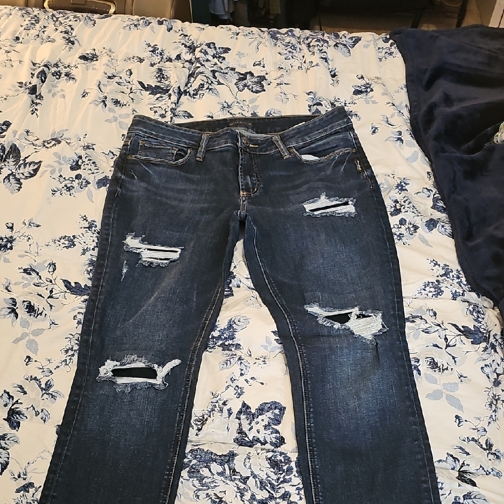 Women's Distressed Blue Jeans